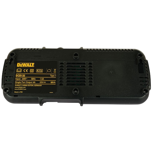 Bottom view of a DEWALT DCB132 black dual port battery charger with yellow product label displaying specifications and ventilation slots.
