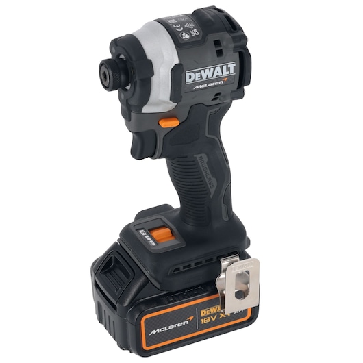 A DEWALT McLaren 18V XR cordless impact driver with a black and orange design, featuring a brushless motor and belt clip attachment.