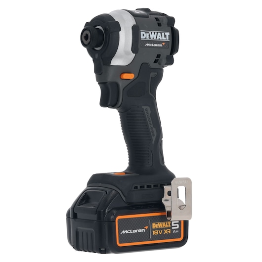 A DEWALT McLaren 18V XR cordless impact driver with a black and orange design, shown standing upright with a 5.0Ah battery attached.