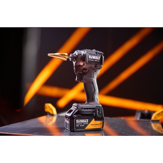 DEWALT tool with drill bit. SKUs: DCF86MP2T-QW, DCF86MP2T. Photography category. Black-yellow background.