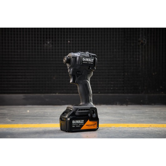 DEWALT tool DCF86MP2T-QW, DCF86MP2T in photography category, shown on floor with black background.