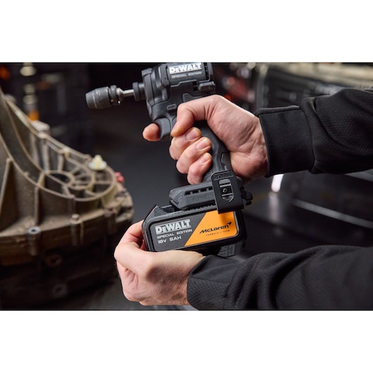 DEWALT tool in hand, DCF86MP2T-QW and DCF86MP2T SKUs visible. Product for photography category.