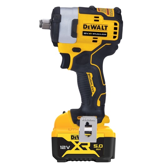 A DEWALT 12V XR brushless cordless impact wrench, model DCF901P1, shown upright with a 5.0 Ah lithium-ion battery attached. The tool is primarily yellow and black with a metal belt clip near the base.