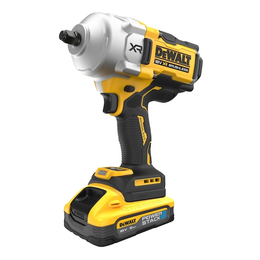 A DEWALT 18V XR brushless cordless impact wrench with PowerStack battery. The tool is yellow and black with a compact design and ergonomic handle.