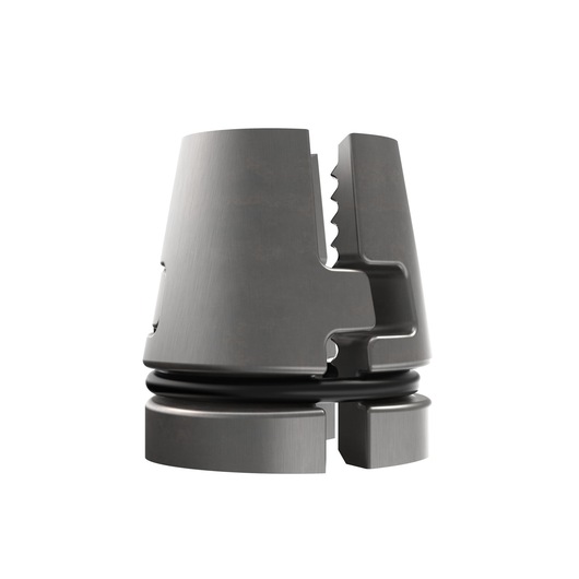 Close-up of a metallic DEWALT accessory part with grooves and a black ring, used in photography equipment.