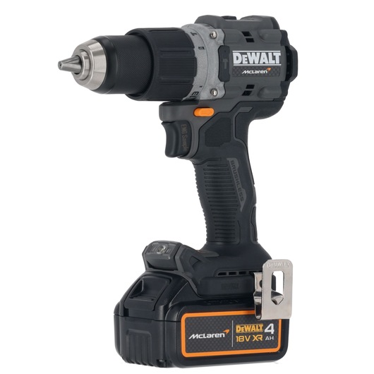 A DEWALT cordless electric drill featuring the McLaren logo, with an 18V XR 4Ah battery attached. The drill has a black and grey body, ergonomic grip, and a belt clip on the base.