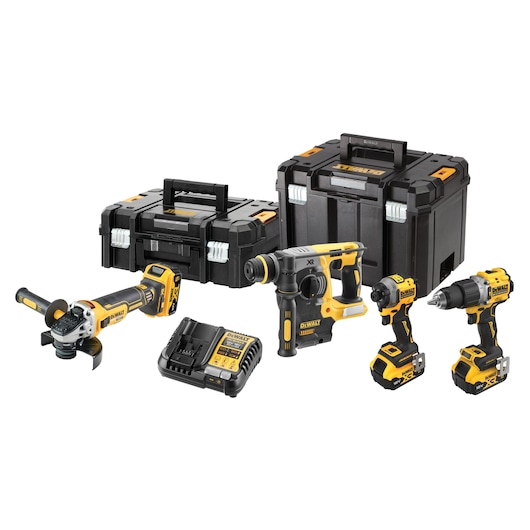 A set of DEWALT cordless power tools, including a drill, impact driver, rotary hammer, grinder, two storage cases, and a battery charger. The tools and accessories are arranged on a white background.