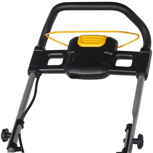 Close-up of the handle and control area of a DEWALT lawn mower, showing the black and yellow design and control lever.