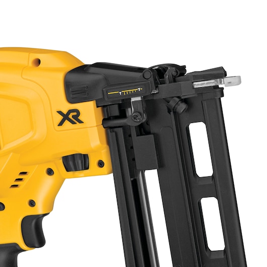Close-up of a yellow DEWALT XR cordless nail gun, showing the magazine and adjustment controls.