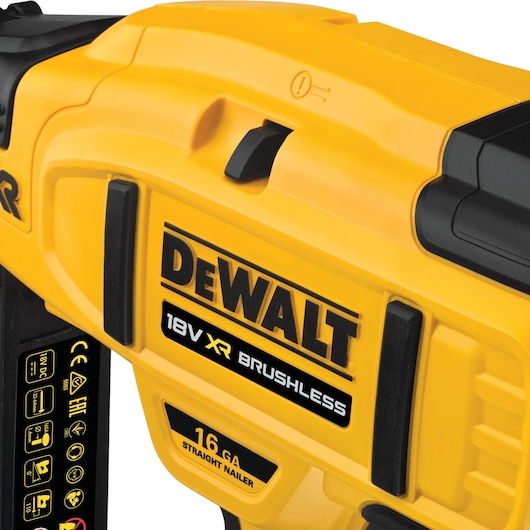 Close-up of a yellow DEWALT 18V XR brushless 16 GA straight nailer tool with visible branding and control switch.