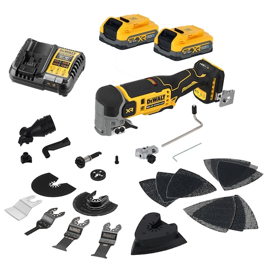 DEWALT DCS359S2 multi-tool kit with blades, sanding pads, charger and two batteries, front angle.
