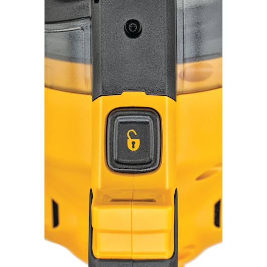 Close-up image of a yellow DEWALT tool featuring a black button with an unlocked padlock icon, indicating a lock or unlock function.