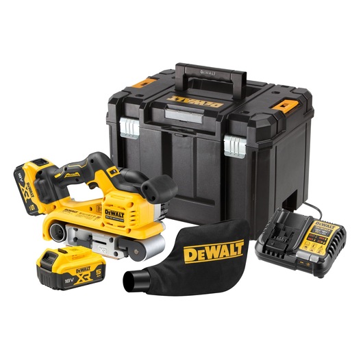 A DEWALT cordless belt sander kit, including a yellow and black belt sander, two 18V XR batteries, a battery charger, a dust bag with DEWALT branding, and a black storage case.