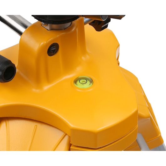 Close-up view of a DEWALT yellow tripod base with an integrated spirit level, used for stabilizing and leveling photography or measuring equipment.