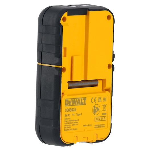 Rear view of a DEWALT DE0892G electronic device, featuring a yellow and black casing with product information and certification labels visible on the back.