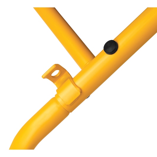 Close-up of a yellow metal frame joint with a bracket and a black button, part of the DEWALT DE7260 photography equipment.