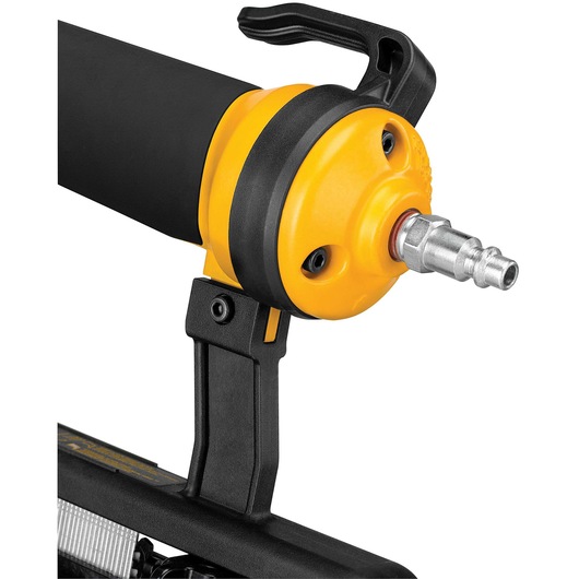 Close-up of a DEWALT pneumatic tool showing its air hose connector and yellow and black housing.