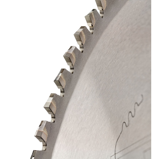 Close-up view of the cutting teeth on a circular saw blade, showing the sharp, metal tips and the edge of the blade.