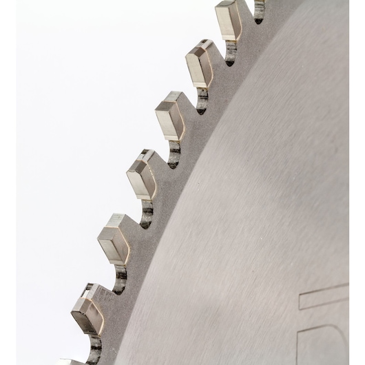 Close-up view of a circular saw blade showing the metal teeth against a white background.