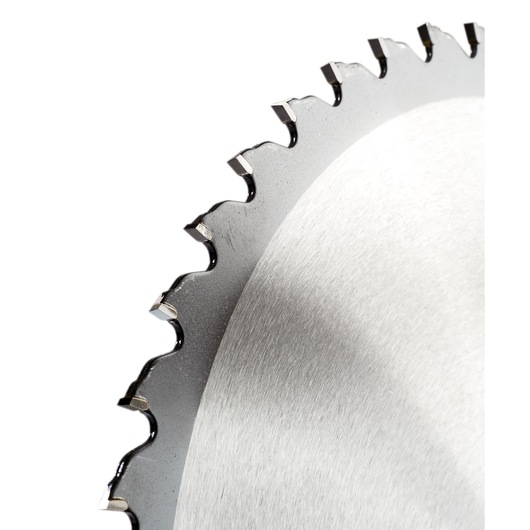 Close-up image of the toothed edge of a circular saw blade made of metal.