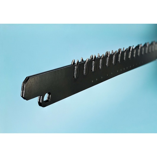 Close-up of a DEWALT hedge trimmer blade DT2974 with sharp teeth against a blue background.