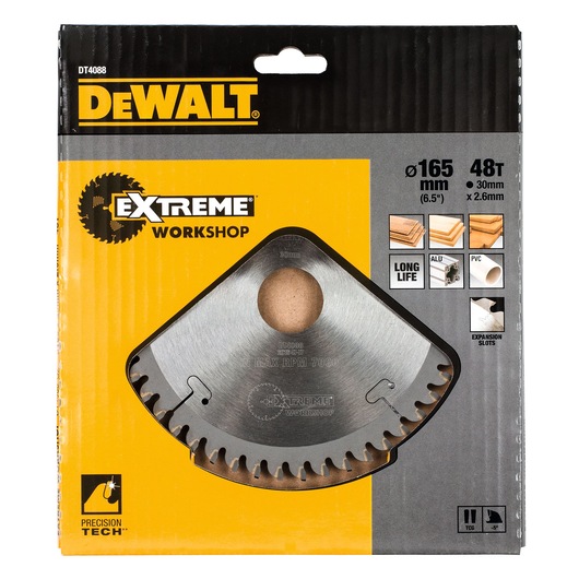 DEWALT DT4088 EXTREME WORKSHOP circular saw blade in its original retail packaging. The packaging is mainly black and yellow with a clear section showing the circular metal blade inside. Text on the packaging indicates the blade is 165 mm (6.5”) in diameter with 48 teeth, a 30 mm bore, and 2.6 mm thickness. The packaging also highlights usage for wood, plywood, aluminium, and PVC, features like long life and expansion slots.