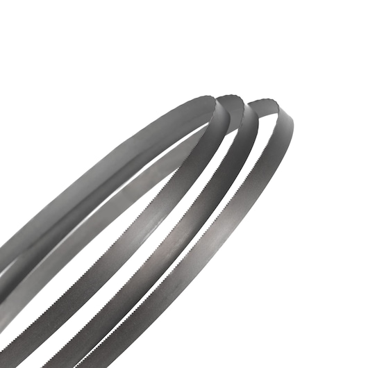 Close-up of three coiled metal band saw blades with fine teeth, shown against a white background.