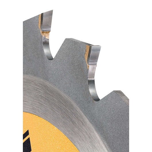 Close-up of a DEWALT circular saw blade showing sharp metal teeth and part of the yellow branding.