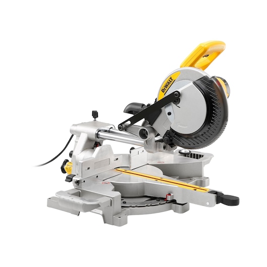 A DEWALT DW712 sliding compound miter saw with a silver and yellow body, featuring a circular blade, adjustable handle, and measurement markings on the base.