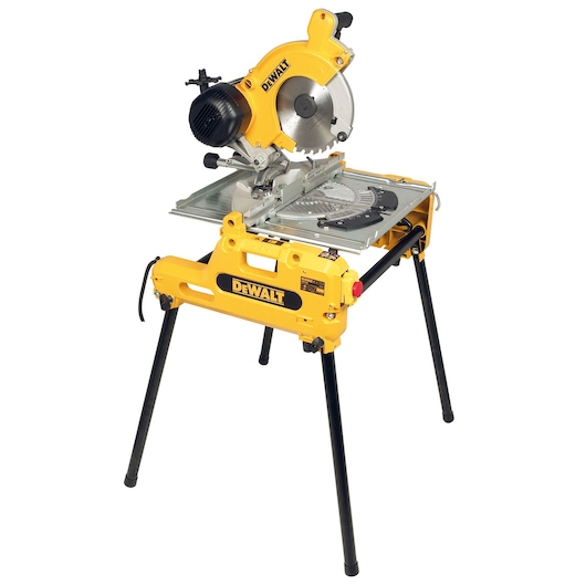 A DEWALT DW743N combination saw with a yellow and black design, featuring a circular blade mounted on a metal table with four black legs. The saw is intended for woodworking and carpentry tasks.