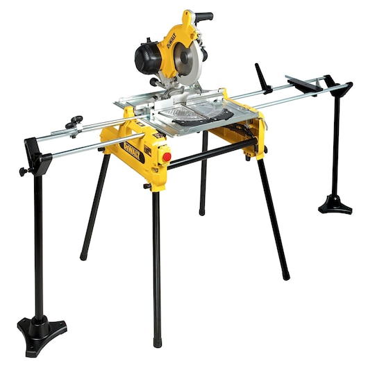 A DEWALT DW743N yellow and black compound miter saw mounted on a foldable stand with extension arms for supporting longer materials.
