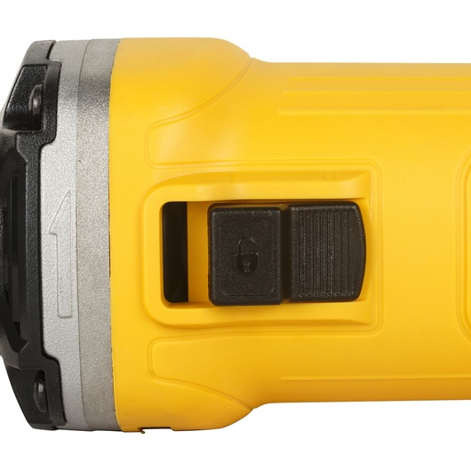 Close-up of yellow DEWALT tool handle with a black lock switch.