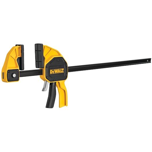 A DEWALT branded trigger clamp with a yellow and black design, featuring a long metal bar and adjustable jaws used for holding materials in place during work.