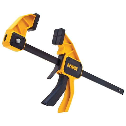 A DEWALT branded one-handed bar clamp with a yellow and black design. The clamp is used for securing and holding materials together during woodworking or construction tasks.