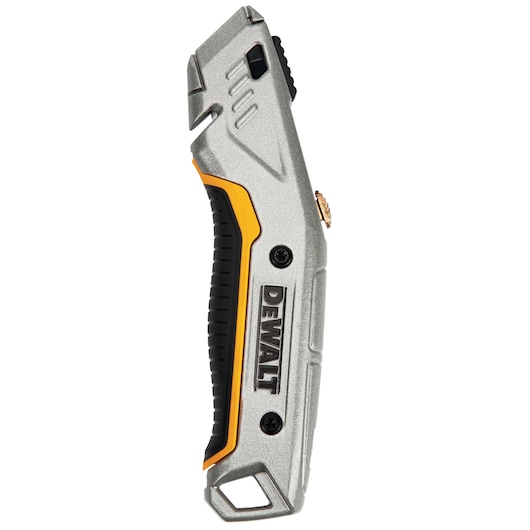 A DEWALT utility knife with a grey and black ergonomic handle and yellow accents, shown from the side.