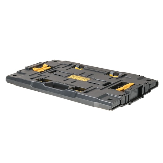 A black and yellow DEWALT flat tool storage tray, designed for organizing and transporting tools. The tray features built-in handles and secure latches for stacking compatibility.