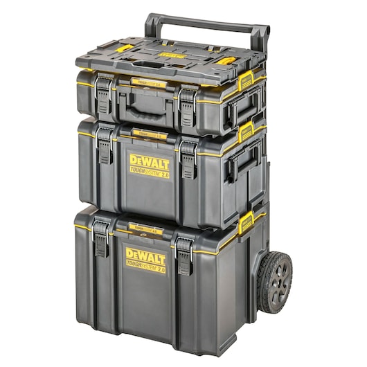 Stacked DEWALT ToughSystem 2.0 tool storage boxes on a wheeled trolley, with three black and yellow modular boxes, suitable for organizing and transporting tools.