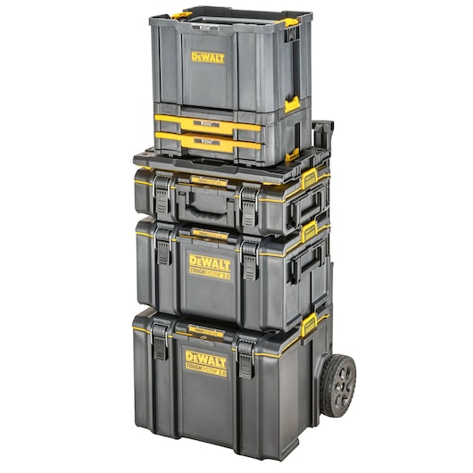 Stack of four black and yellow DEWALT ToughSystem toolboxes, including a wheeled base unit, designed for secure storage and transport of tools.