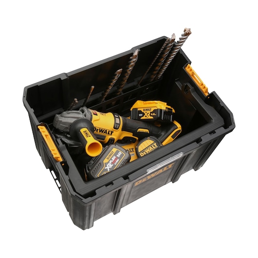 DEWALT toolbox with power tools, batteries, and drill bits inside a black container.