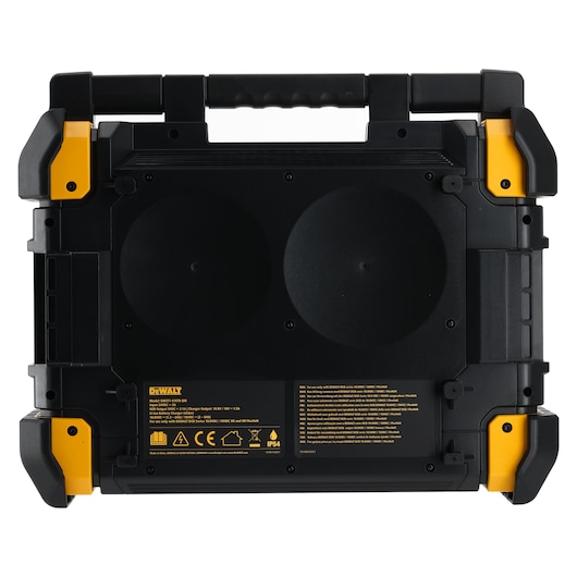 Black DEWALT storage box with yellow accents, sturdy handle, and safety labels on the front side.