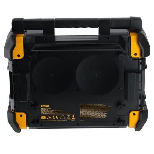 Rear view of a DEWALT portable radio with handle, black and yellow design, branded label and safety info visible.