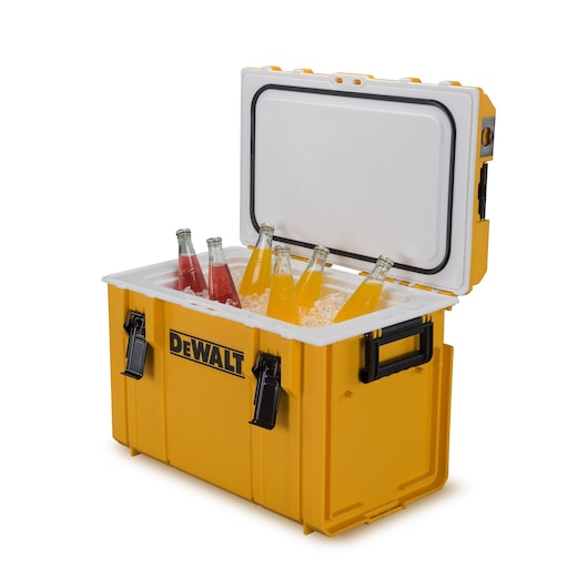 Yellow DEWALT cooler box open, filled with bottles and ice. Bottles contain orange and red drinks.