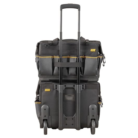 DEWALT rolling tool bag with telescopic handle and wheels, black with yellow accents, front view.