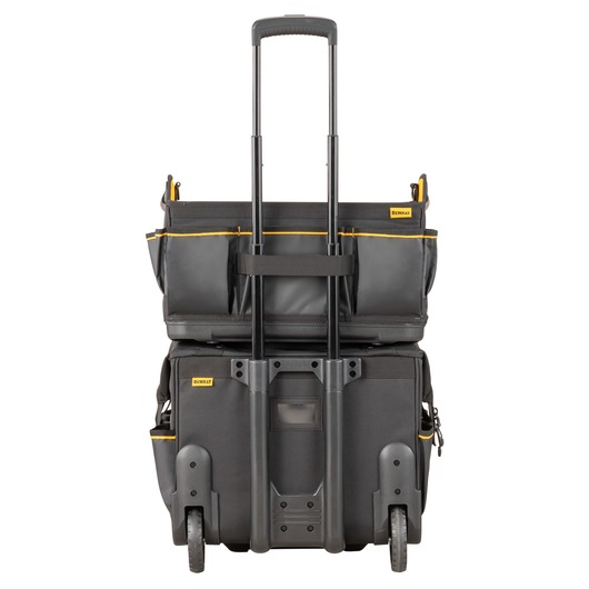 DEWALT rolling tool bag with telescopic handle and multiple compartments, viewed from the rear.