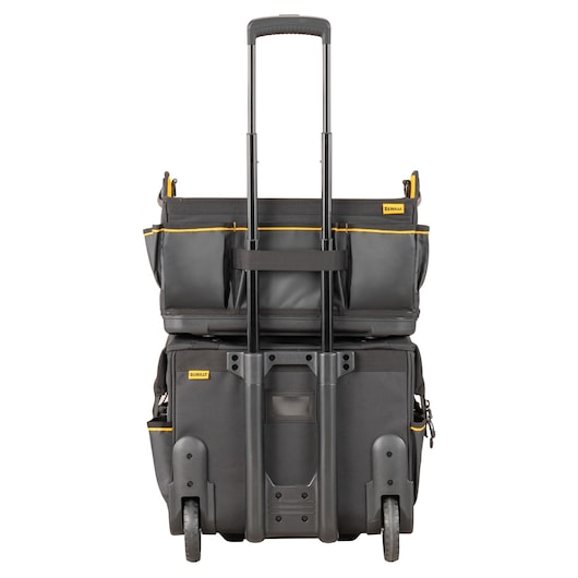 DEWALT rolling tool bag with telescopic handle, multiple compartments, and wheels for easy transport.