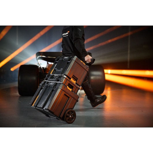 Stacked rolling hard cases with wheels for photography equipment, portable and secure transport.