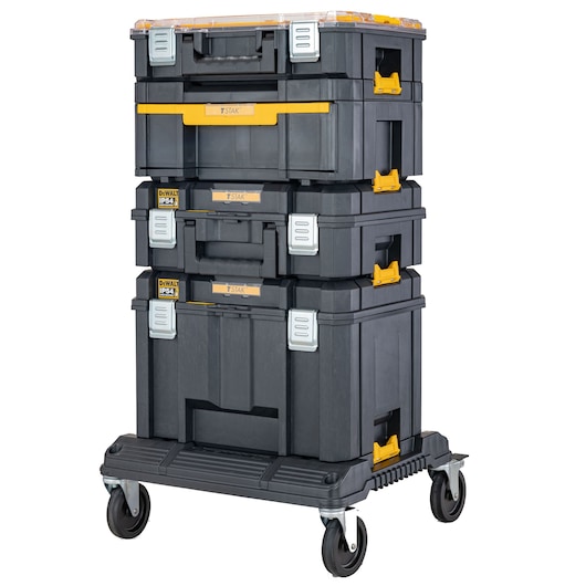 Stacked DEWALT TSTAK tool storage boxes on a wheeled base, black with yellow latches and handles.