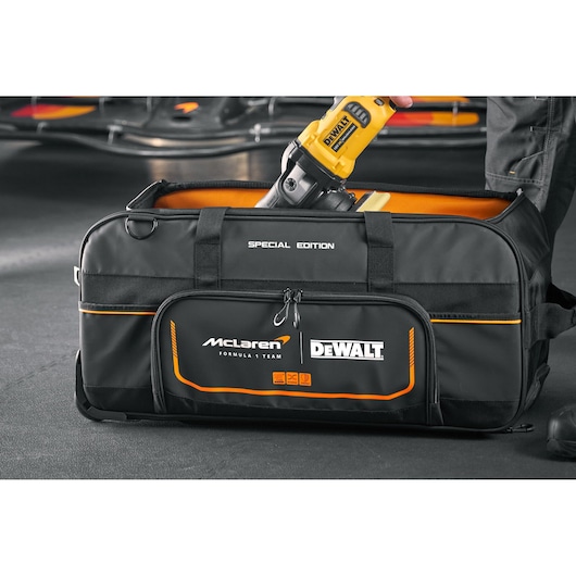 DEWALT special edition tool bag with McLaren branding and a yellow power tool inside.