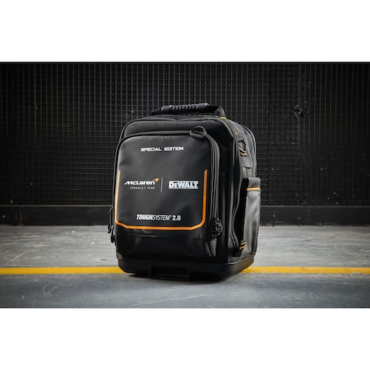 Special Edition DEWALT ToughSystem 2.0 tool bag with McLaren branding on a concrete floor.
