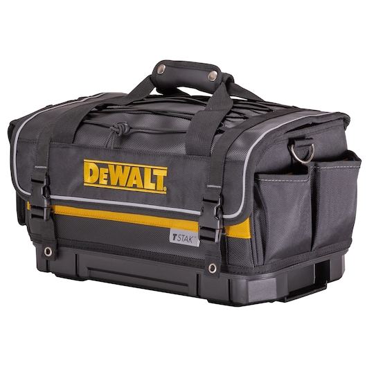 Black DEWALT tool bag with yellow accent, handle, and outer pockets. TSTAK label visible at the front.